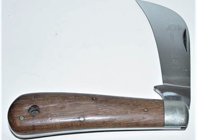 "#1, Queen, pruning or hawkbill, one 3” blade, rosewood handles, brass liners, NS bolsters, Queen Steel #1 etch, no tang stamp, 4-1/8”"
