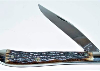 "#11, Queen, utility, 1 carbon steel blade, Rogers bone handles, brass liners, NS bolsters, no etch, big Q tang stamp, 4-1/8”"