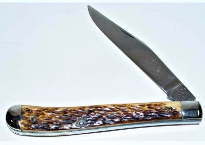 "#11, Queen, utility, 1 carbon steel blade, Rogers bone handles, brass liners, NS bolsters, no etch, crown over Queen tang stamp, 4-1/8”"