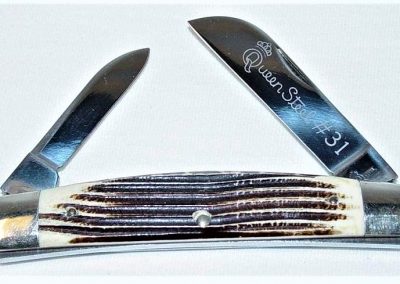 "#31, Queen, large congress, 2 blade, fine jigged Winterbottom bone handles w/six groves, brass liners, NS bolsters, Queen Steel #31 etch, Q STEEL tang stamp, 4”"
