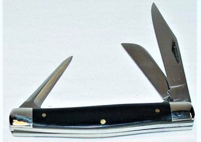 "#38, Queen, stockman, 3 blade w/punch, slick black handles, brass liners, NS bolster, Queen Steel #38B Made in USA etch, Q 22-72 tang stamp, 3-1/4”"