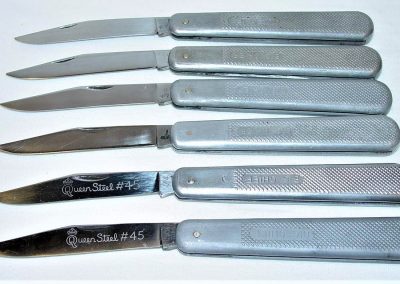 "(top to bottom) #45, Queen, Big Chief, 1 blade, aluminum handles, enclosed spring, no etch, Q STAINLESS tang stamp w/Pat Pending stamped on backside of blade, 5”"