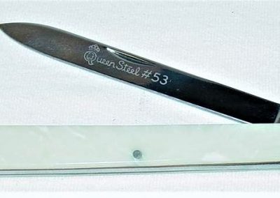 "#53, Queen, citrus fruit, 1 blade, simulated pearl handles, brass liners, NS bolsters, Queen Steel #53 etch, no tang stamp, 4-5/8”"
