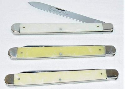 "Top: #53, Queen, citrus fruit knife, 1 blade, simulated Pearl handles, brass liners, NS bolsters, 4-5/8”, Center: #53, Queen, citrus fruit knife, 1 blade, amber handles, brass liners, NS bolsters, 4-5/8”, Bottom: #53, Queen, citrus fruit knife, 1 blade, imitation onyx handles, brass liners, NS bolsters, 4-5/8”