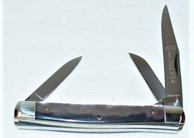 "#54, Queen, small serpentine, 3 blade, smoked pearl handles, brass liners, NS bolsters, Queen Steel #54 etch, no tang stamp, 2-5/8”"