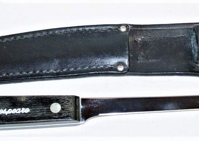 "#72, (prototype), Queen, hunting knife, laminated Wood handles w/Shakespeare inscription, no etch, no tang stamp, 6-1/4”"