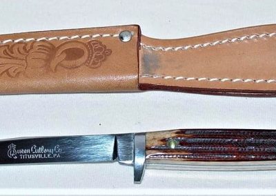 "#74, Queen, hunting knife, brown Winterbottom bone handles, script Queen Cutlery Co. TITUSVILLE, PA etch, no tang stamp, 3-3/4”"