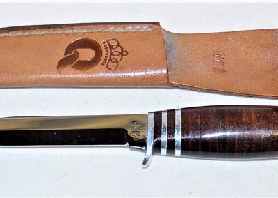 "#84, Queen, hunting knife, stacked leather handles w/aluminum spacers, no etch, Q tang stamp w/STAINLESS on back, 4-1/4”"