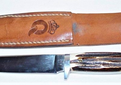 "#89, Queen, hunting knife, brown Winterbottom bone handles, no etch, sideways big Q tang stamp w/STAINLESS on back, 4” blade"