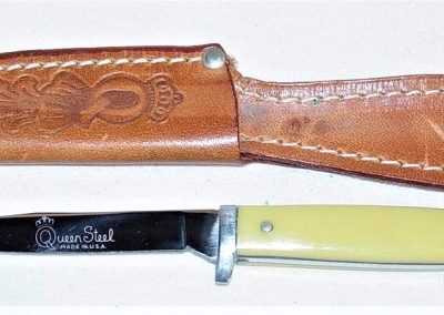 "#91, Queen, hunting knife, amber handles, script Queen Steel Made in U.S.A. etch, no tang stamp, 3”blade"