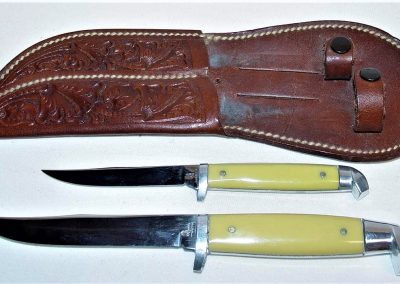 "#94, Queen, twin set hunting knives, amber handles, no etch, Queen over STAINLESS tang stamp, 4” & 3” blades"
