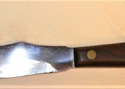"Queen, one arm man knife-fork combination, rosewood handles, script Queen Cutlery Co. TITUSVILLE, PA etch, no tang stamp, 4-1/2” blade"