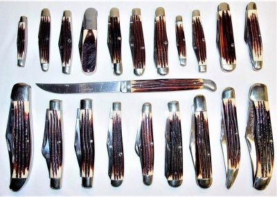 "Queen: Twenty-one Queen cutlery patterns with the scarce burnt orange composition handle material, late ‘60s era."