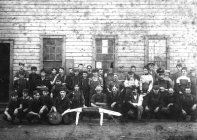 employees of New York Cutlery Co pose outside the factory in Gowanda, NY sometime around 1900