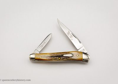 "Schatt & Morgan pocketknife, Keystone Series IX, 2-blade, burnt stag handles with keystone shield, brass liners, NS bolsters, 3 1/8", issued in 1999"