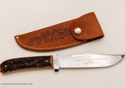 "Queen fixed blade camp knife, saber ground stainless steel drop point blade, integrated screwdriver and can opener, jigged brown bone handles, leather sheath, Queen City block stamp, blade etch Queen Cutlery Collectors 2005, One of Fifty, 9""
