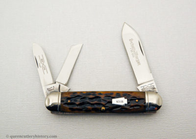 "Schatt & Morgan pocketknife, Keystone Series XIII, 3-blade, golden age jigged bone handles with sterling silver keystone shield, brass liners, NS coined bolsters, 3 1/2", issued in 2003"